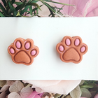 The Paw Print by the Door